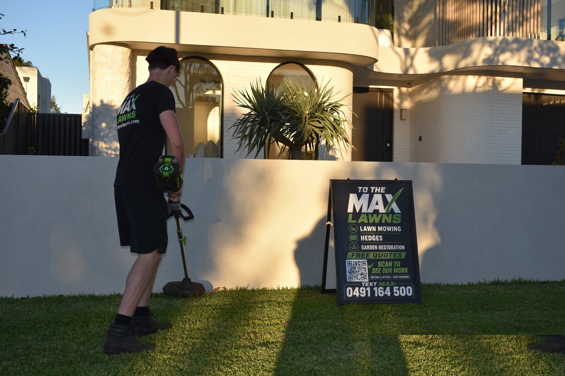 Max whipper snipping fence lines or tight edges